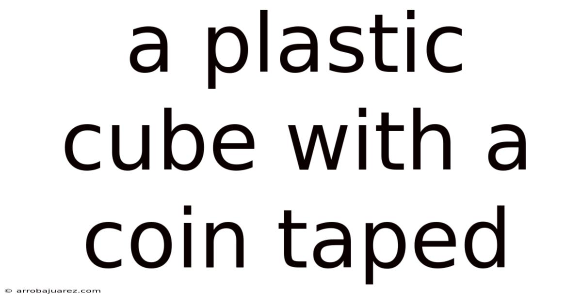 A Plastic Cube With A Coin Taped