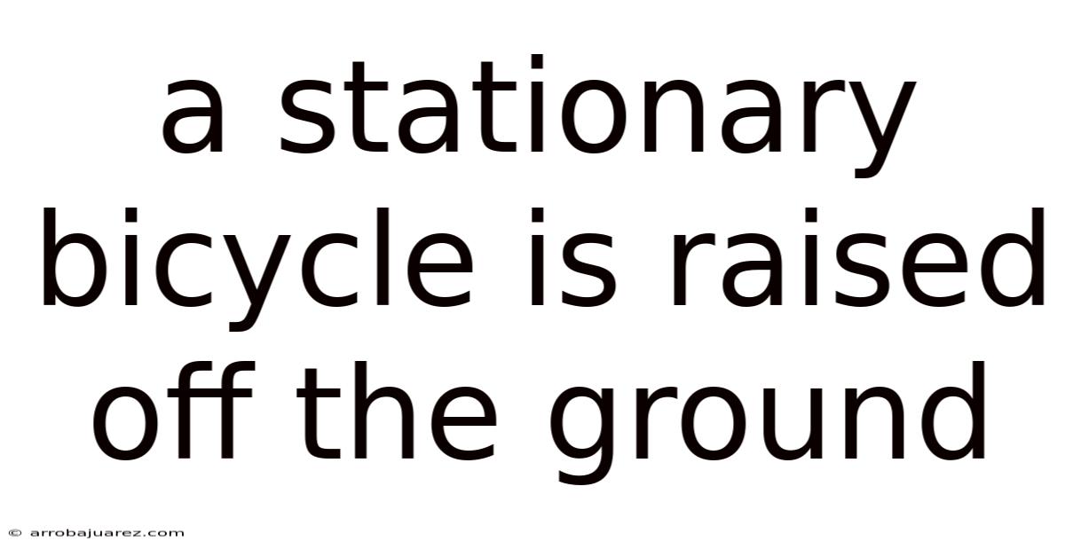 A Stationary Bicycle Is Raised Off The Ground